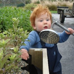 Starting young - Dylan helping with watering