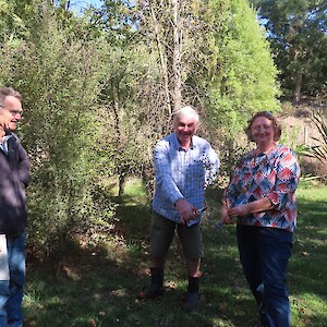 Tai Tapu - Owner Peter giving Jo a plant to draw, with Brian looking on!